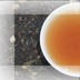 Bild von Zimtpfläumchen, schwarzer und grüner Tee